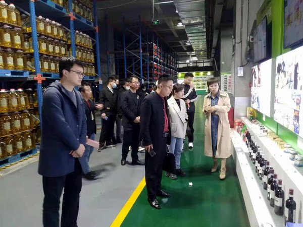 石晓英一行赴西安爱菊粮油工业集团开展